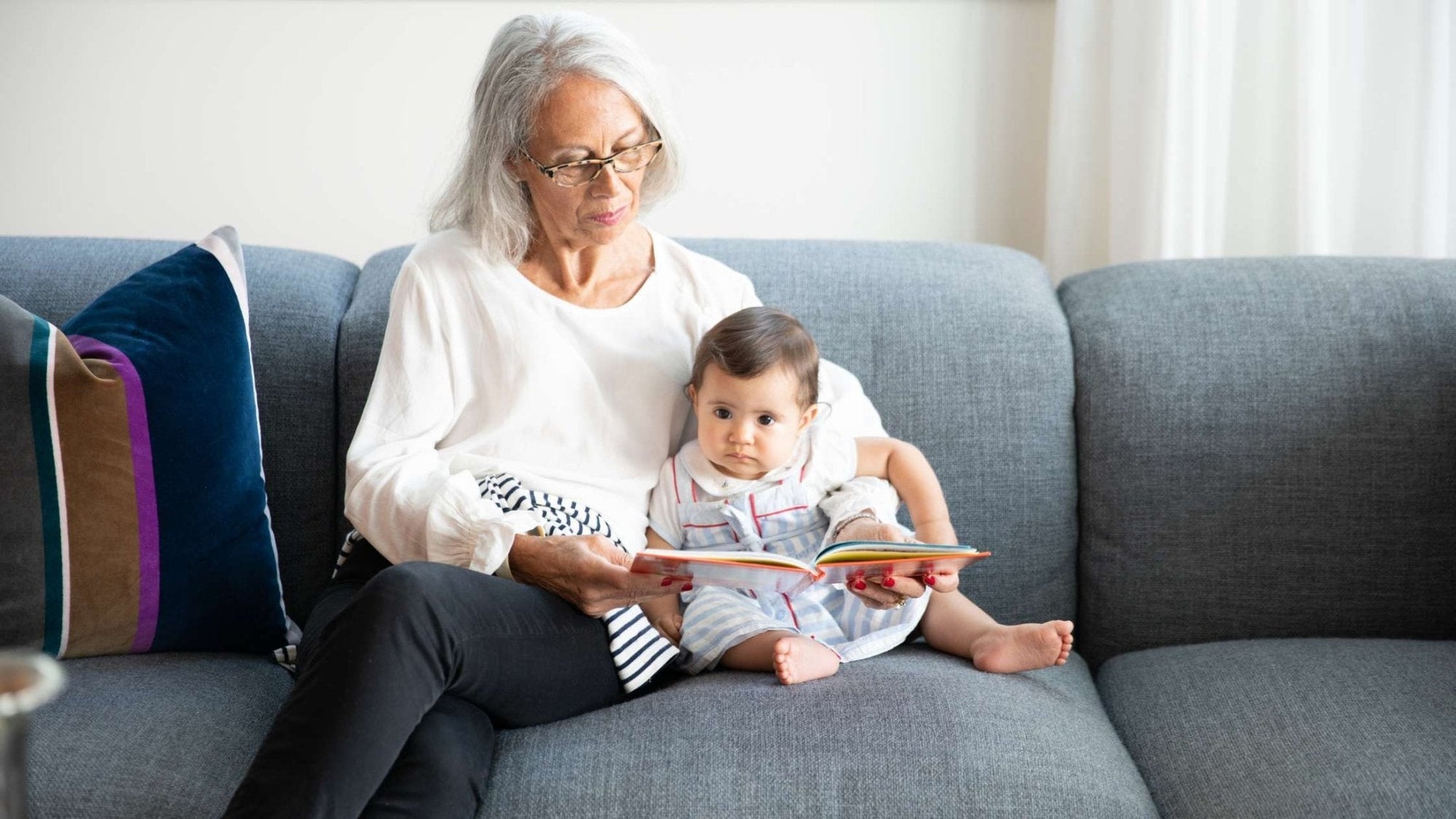 2 young children with grandparents posing for photo